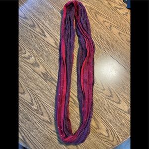 Infinity scarf in purple hues.